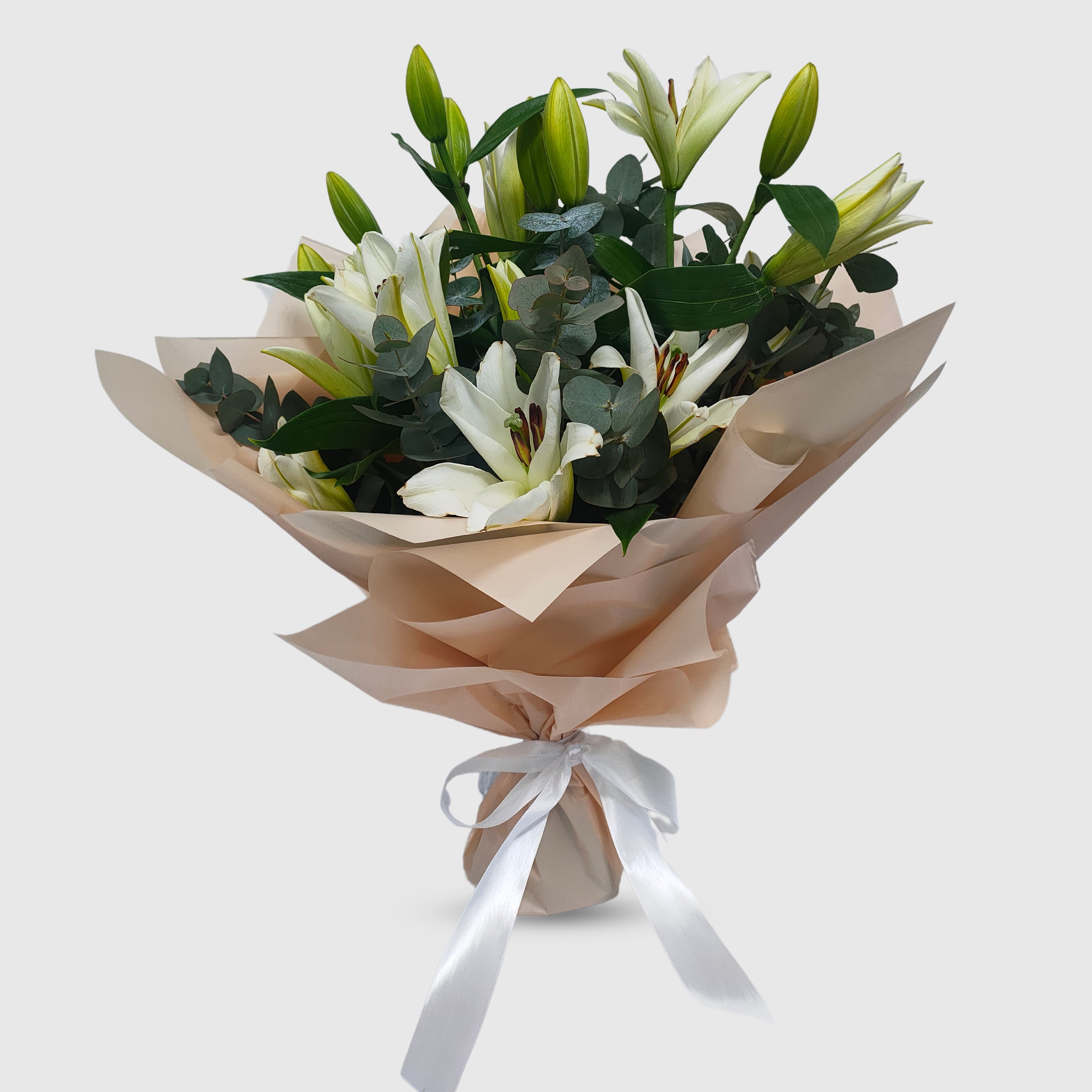 white lily hand bouquet White Lily Garden Bunch – ArabianPetalsFlower